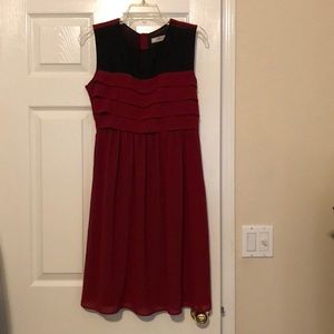 Romy size small black and cranberry dress.